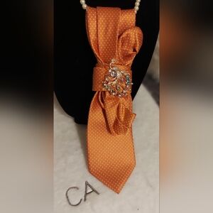 Elegant Orange Polka Dot Tie with Brooch